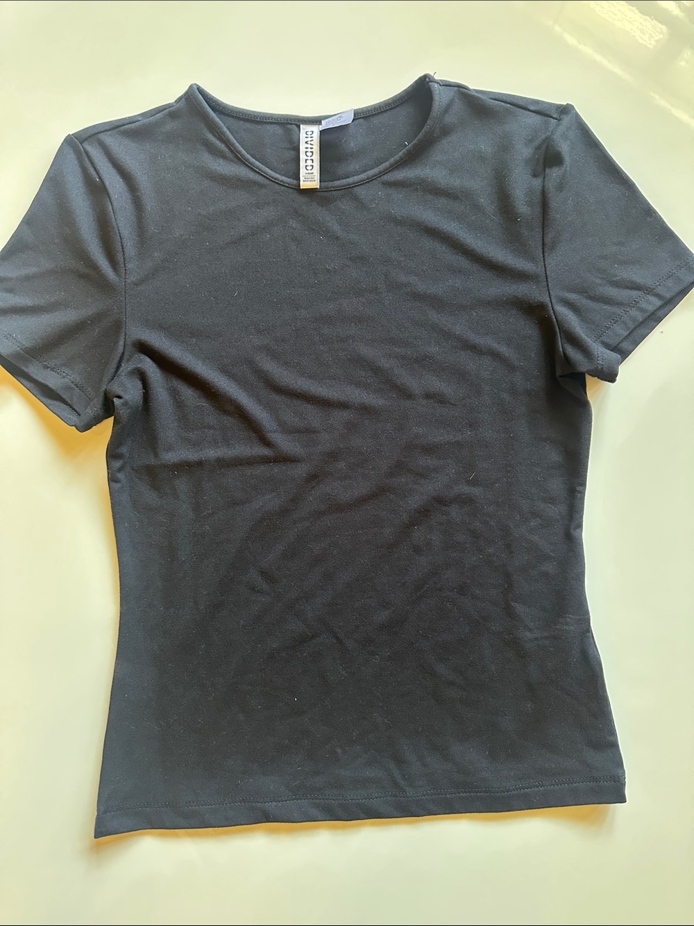NWOT - Divided Black Baby Tee